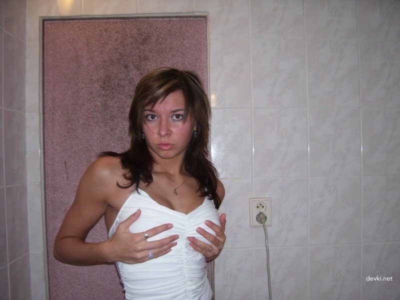Naked and Wet: Sexy Woman Stepping Out of Shower
