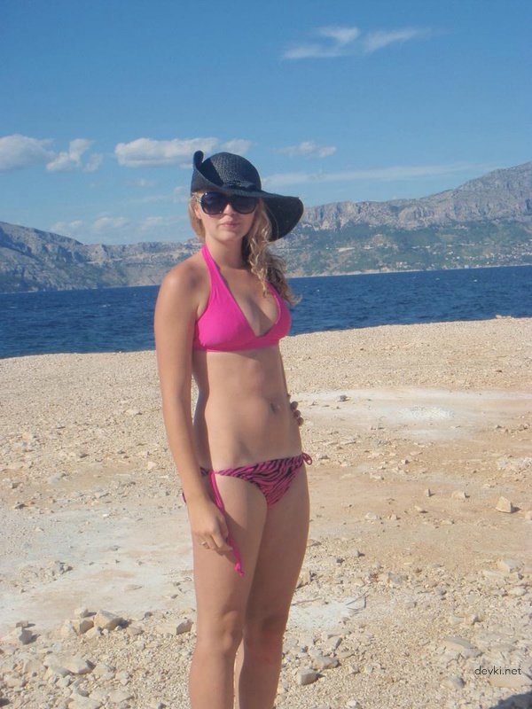 Best Friends at the Beach: Hot Bikini Babes Sunbathing and Having Fun