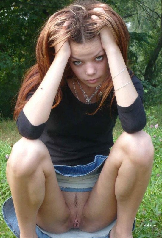 Hot young girl flaunts pussy - Explicit close-up photo