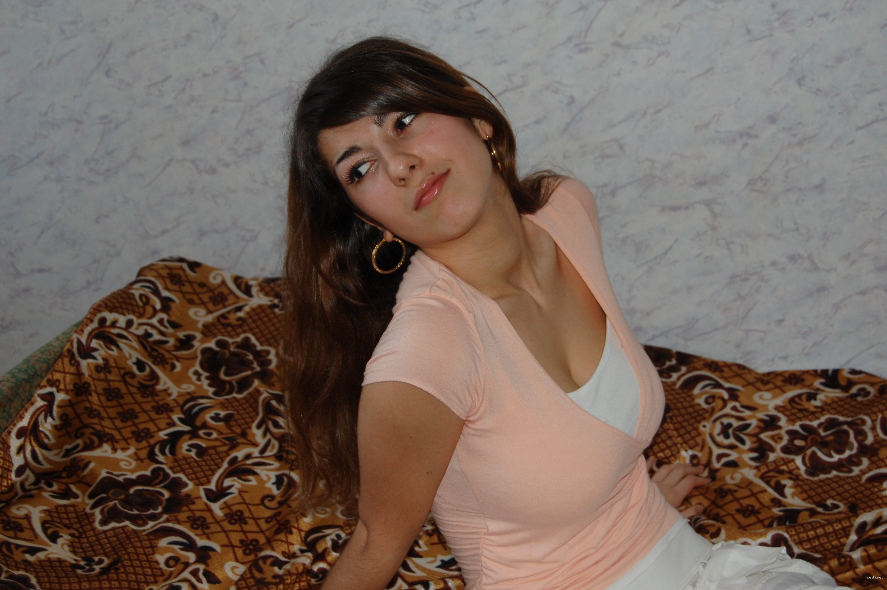 Unrestrained Woman Exposes Massive Breasts in Provocative Display