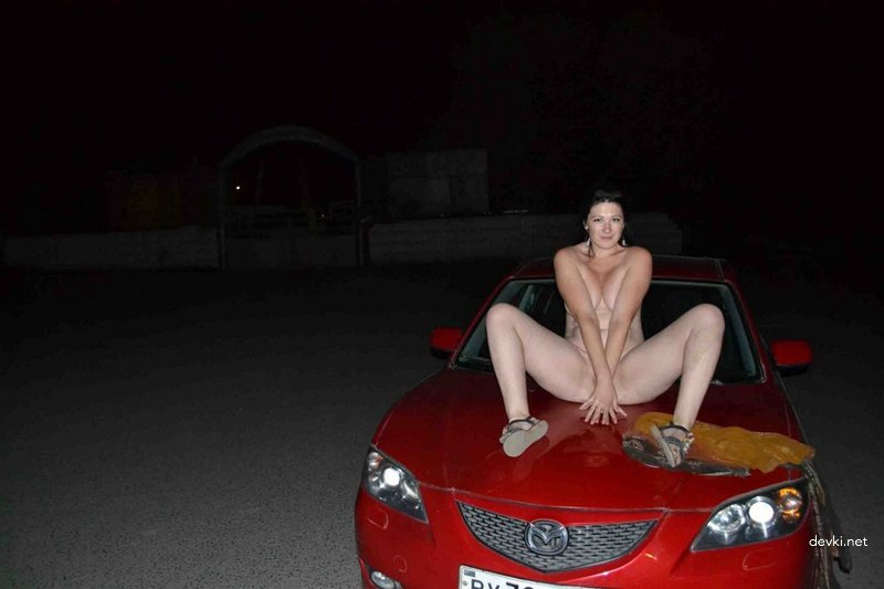 Brunette Strips on the Beach: Explicit Nude Photoshoot