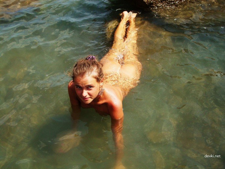 Naked Girl Sunbathing and Skinny Dipping in the Sea - Explicit Beach Fun