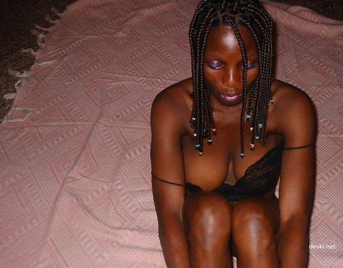 Juicy Ebony Babe: Tempting and Sultry Black Woman Exposing Her Curves