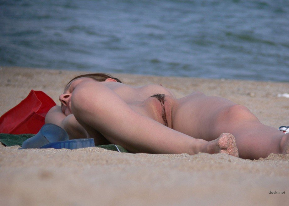 Hot Girls Sunbathing with Their Pussies Out on the Beach