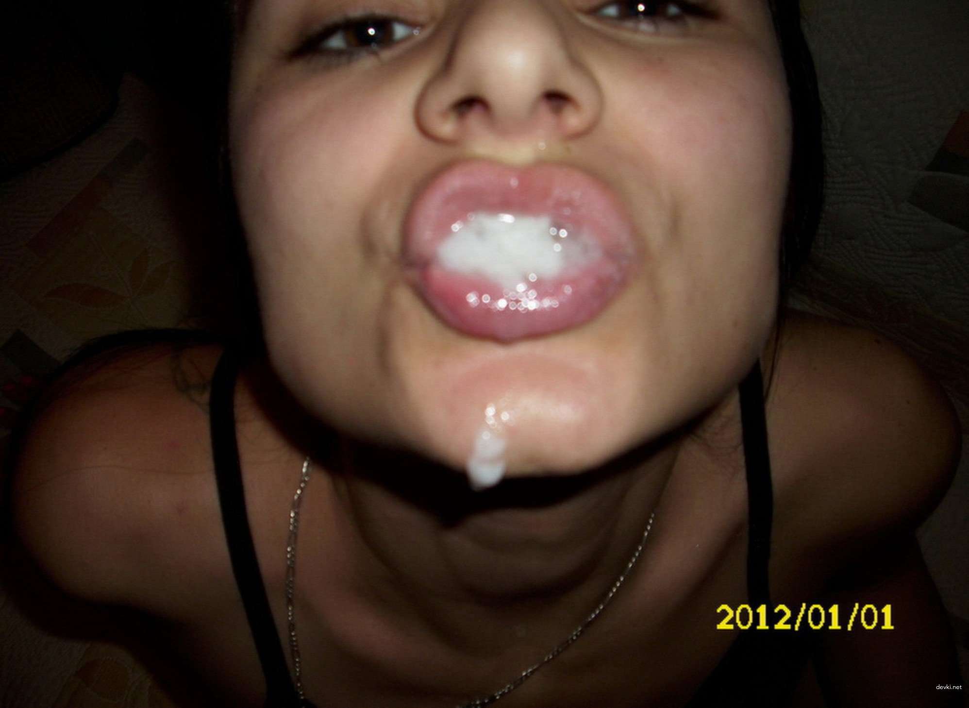 She Loves Swallowing Cum: Explicit Blowjob Photo