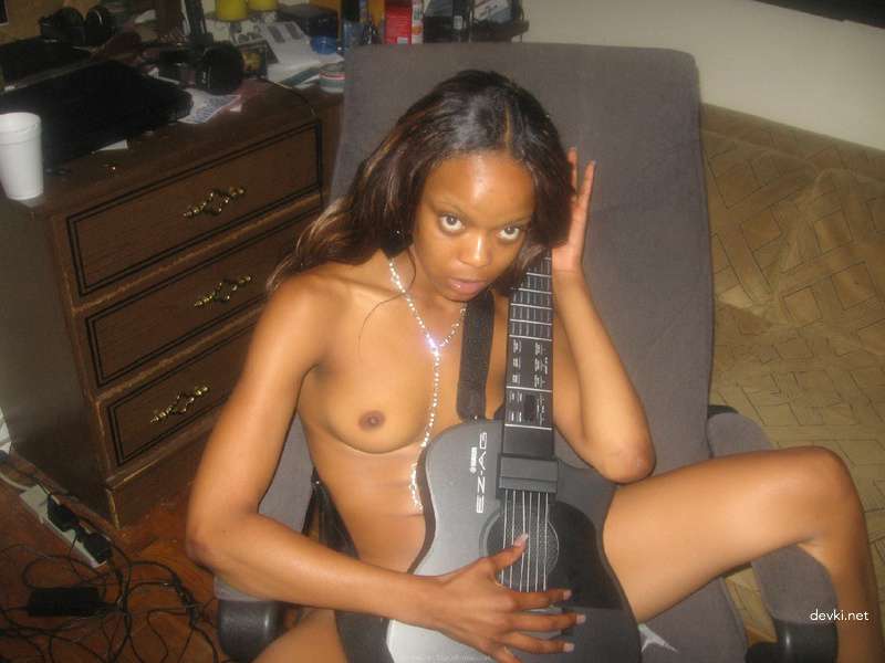 Black woman strips naked - explicit nude photo