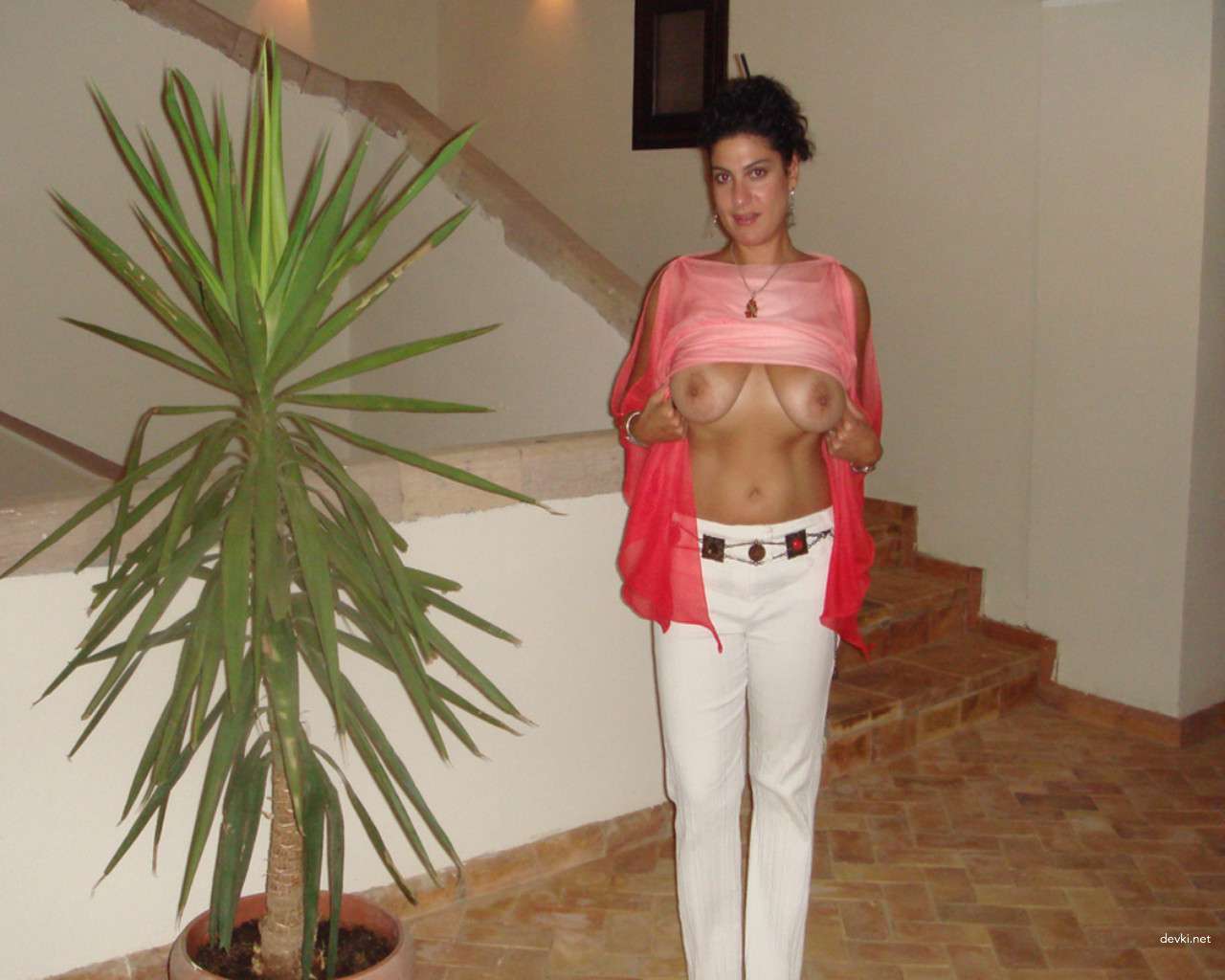 Sensual Woman with Big Breasts in Erotic Pose: Explicit Adult Content