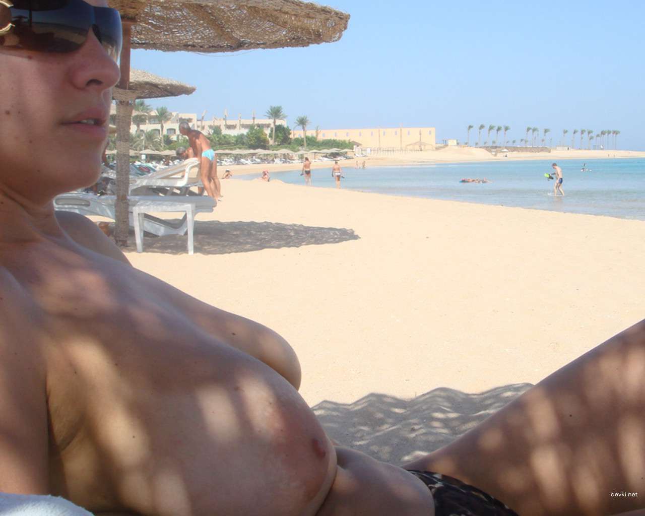 Sensual Woman with Big Breasts in Erotic Pose: Explicit Adult Content