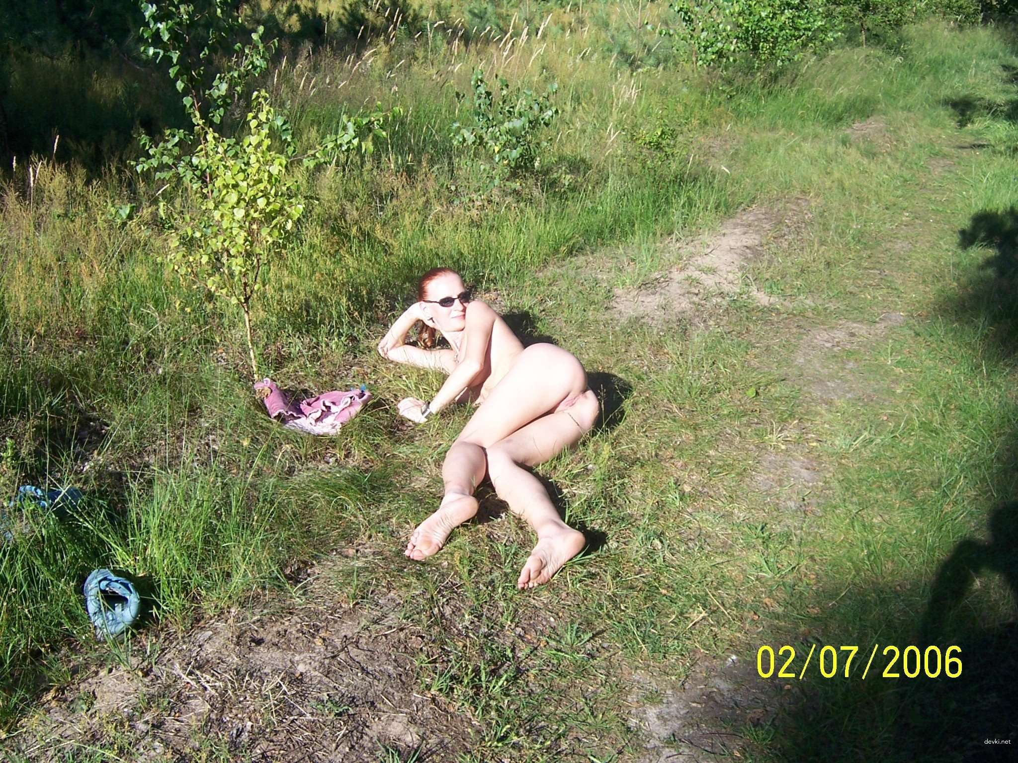 Naked Woman Strips Down for Hardcore Action - Explicit Nude Photo