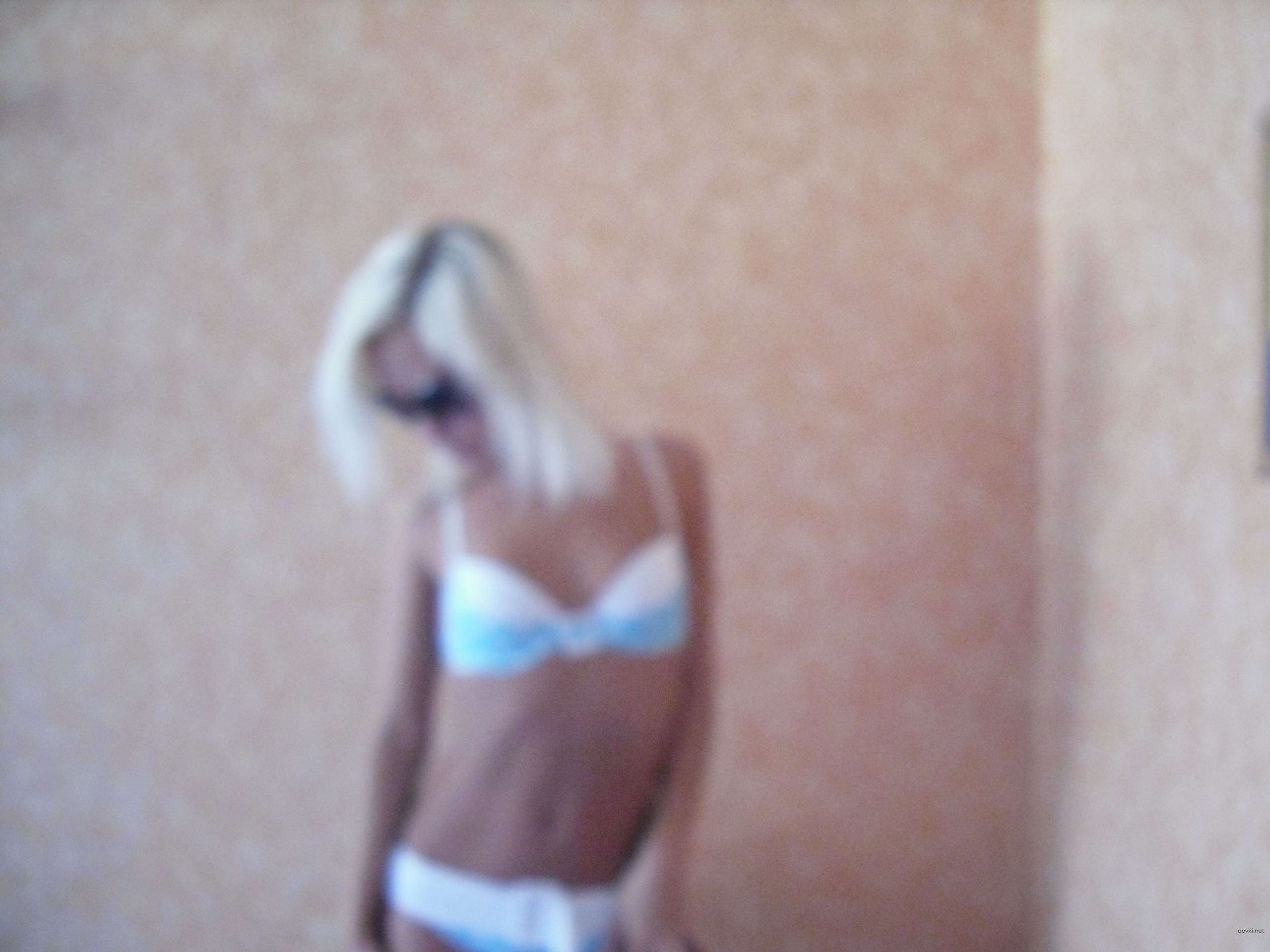 Sexy Blonde Beauty in Intimate Portrait - Seductive Russian Woman with Stunning Looks Exposed