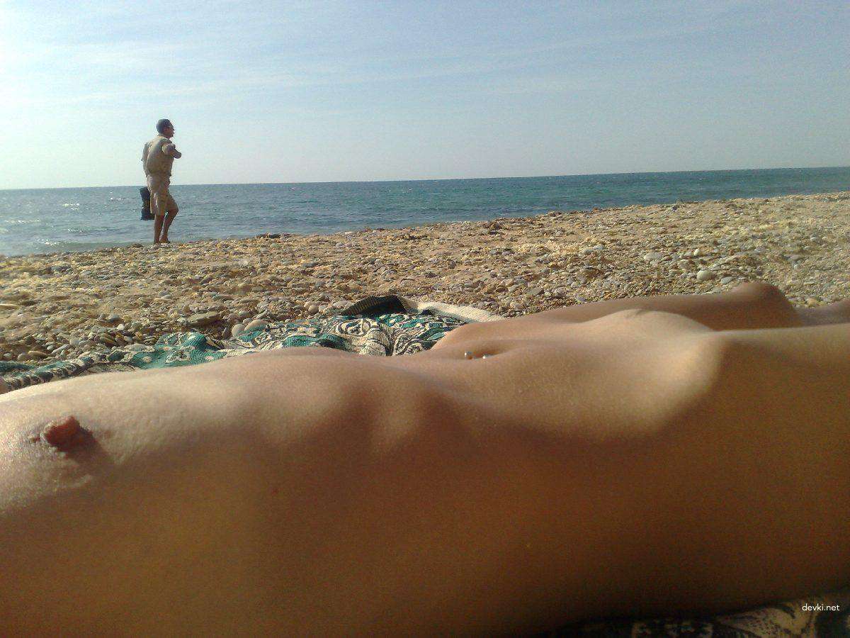 Slender Blonde Babe at the Beach: Hot Bikini Body on Display