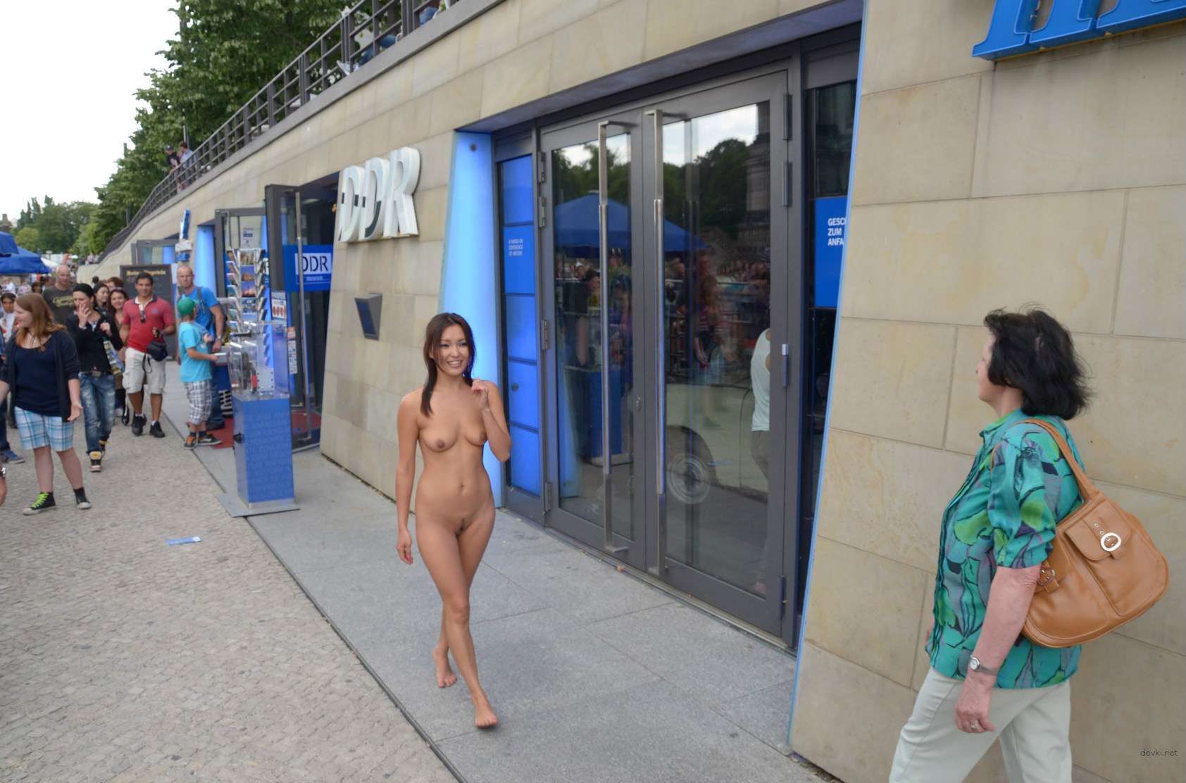 Naked Asian Girl Walking in the Street: Explicit Public Nudity in Broad Daylight