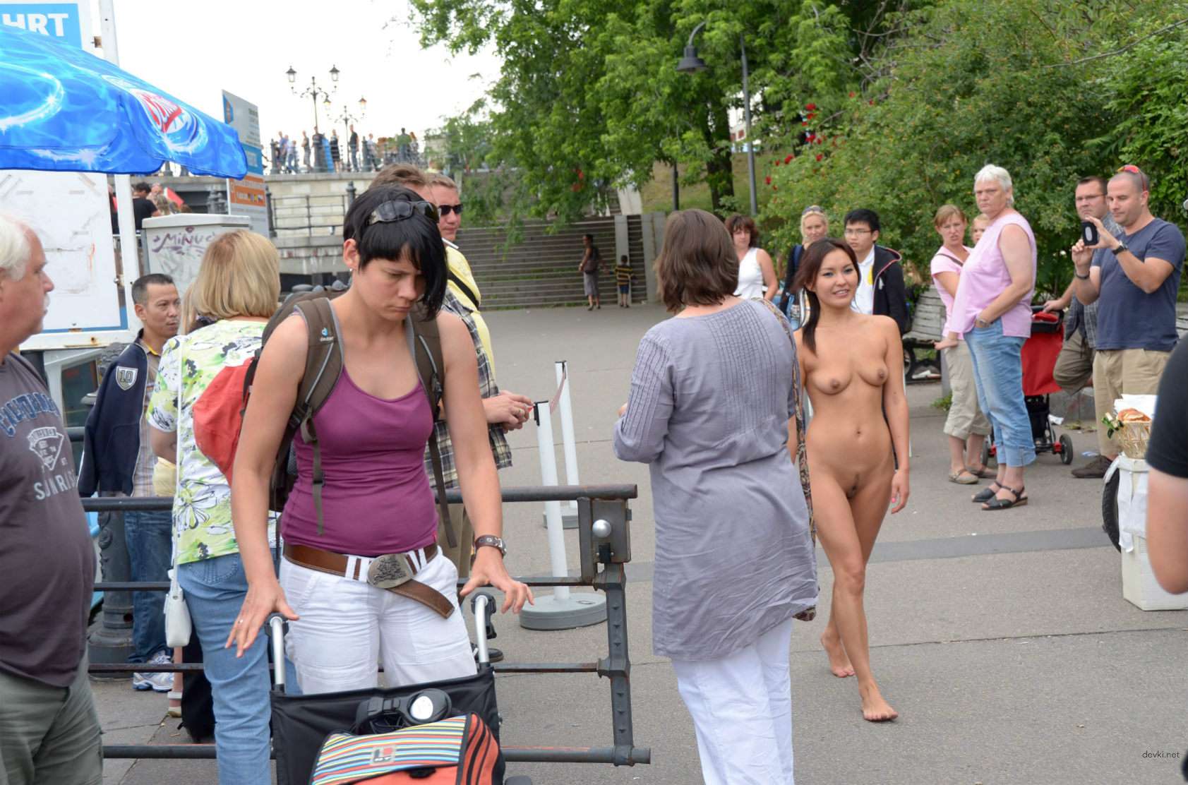 Naked Asian Girl Walking in the Street: Explicit Public Nudity in Broad Daylight