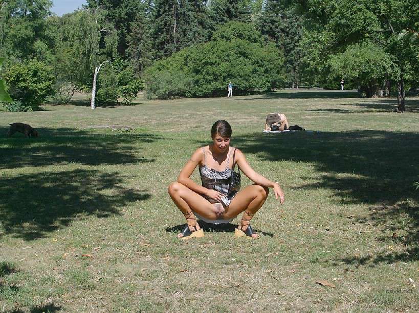 Naked Chick Struts Through City Streets - Explicit Public Nudity