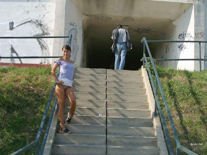 Naked Chick Struts Through City Streets - Explicit Public Nudity