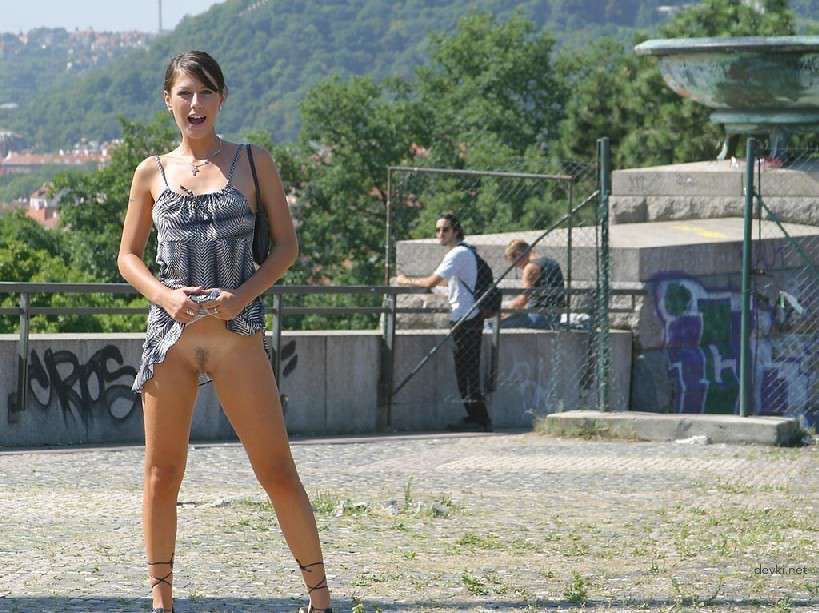 Naked Chick Struts Through City Streets - Explicit Public Nudity