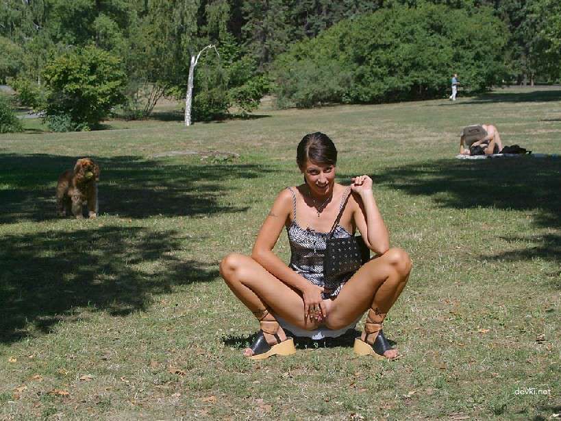 Naked Chick Struts Through City Streets - Explicit Public Nudity