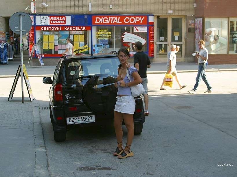 Naked Chick Struts Through City Streets - Explicit Public Nudity