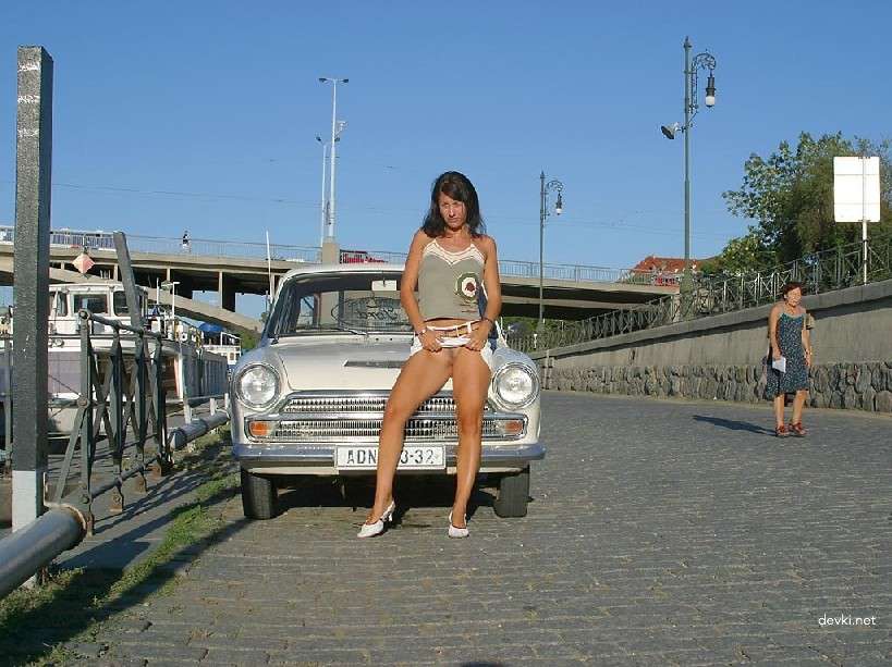 Naked Chick Struts Through City Streets - Explicit Public Nudity