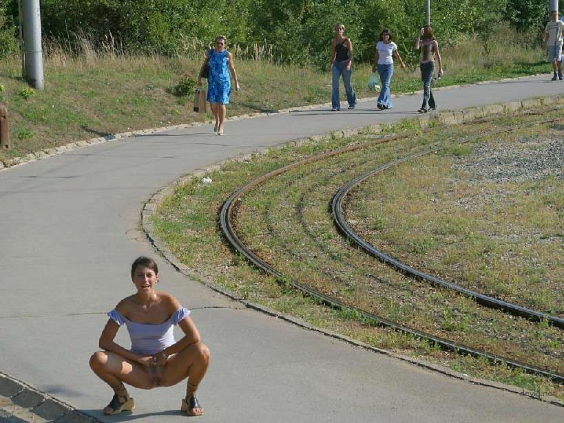 Naked Chick Struts Through City Streets - Explicit Public Nudity