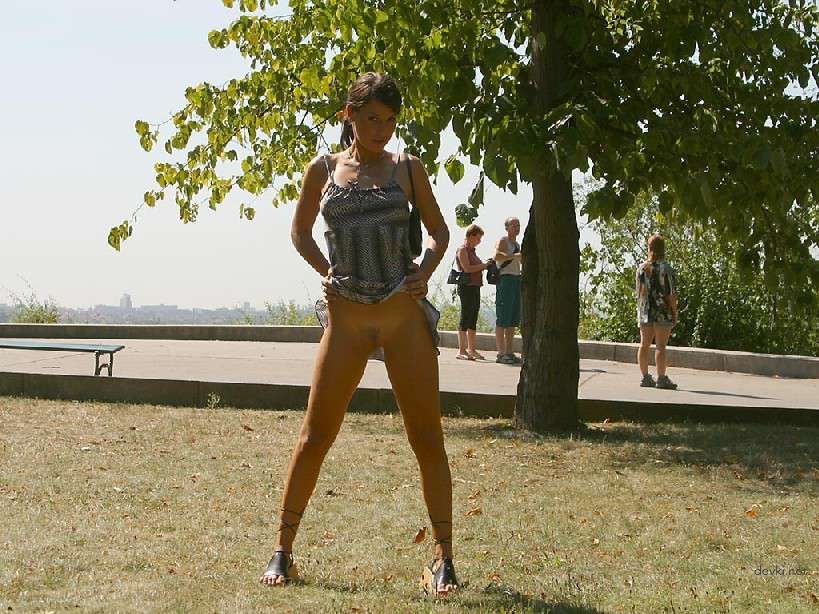 Naked Chick Struts Through City Streets - Explicit Public Nudity