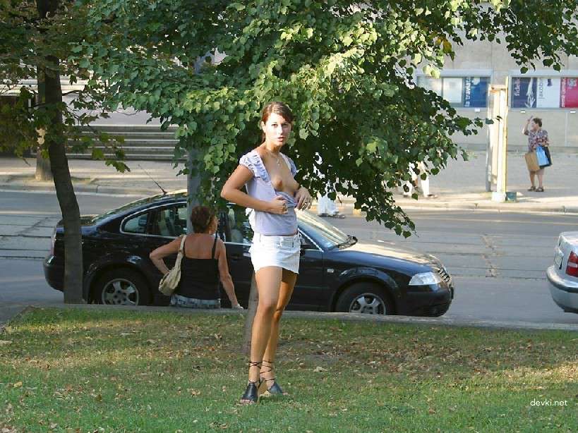 Naked Chick Struts Through City Streets - Explicit Public Nudity