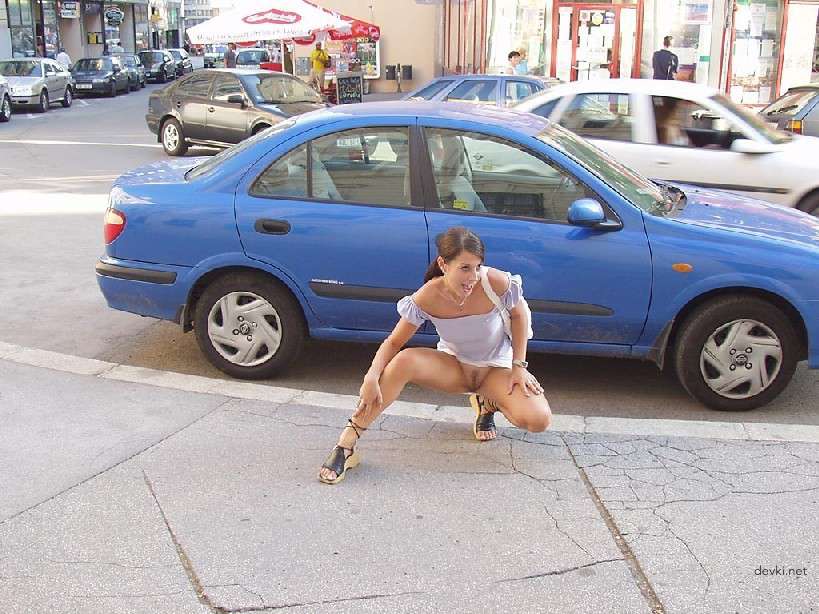 Naked Chick Struts Through City Streets - Explicit Public Nudity