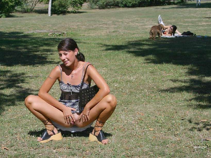 Naked Chick Struts Through City Streets - Explicit Public Nudity