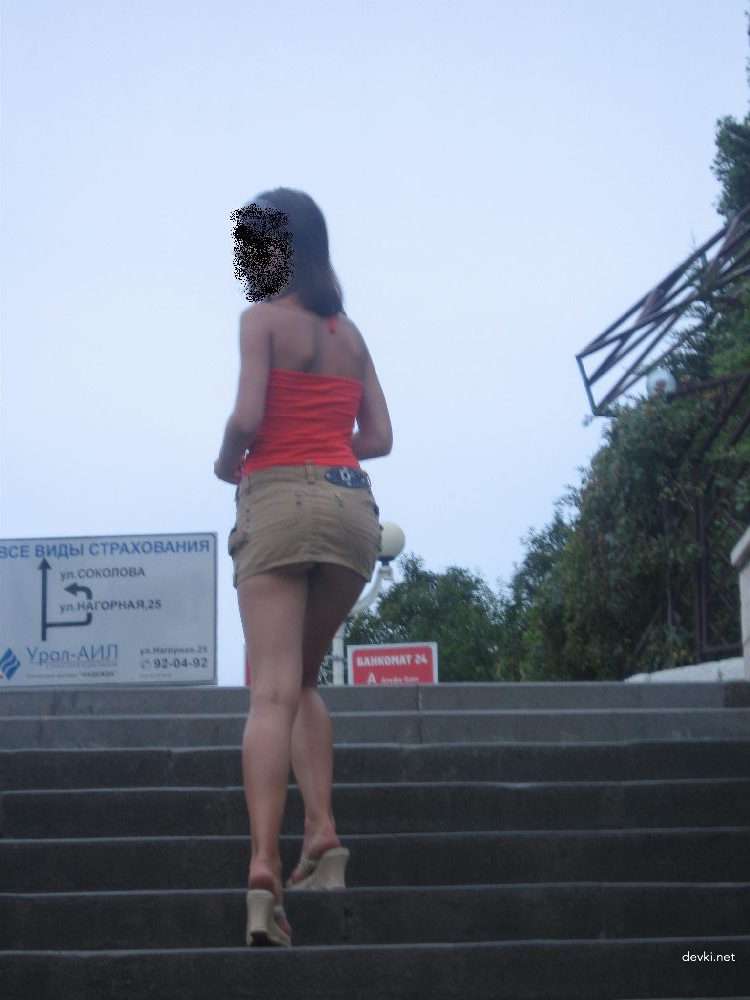 Seductive Girl with Hot Legs: Sexy Russian Babe Exposing Her Perfect Body