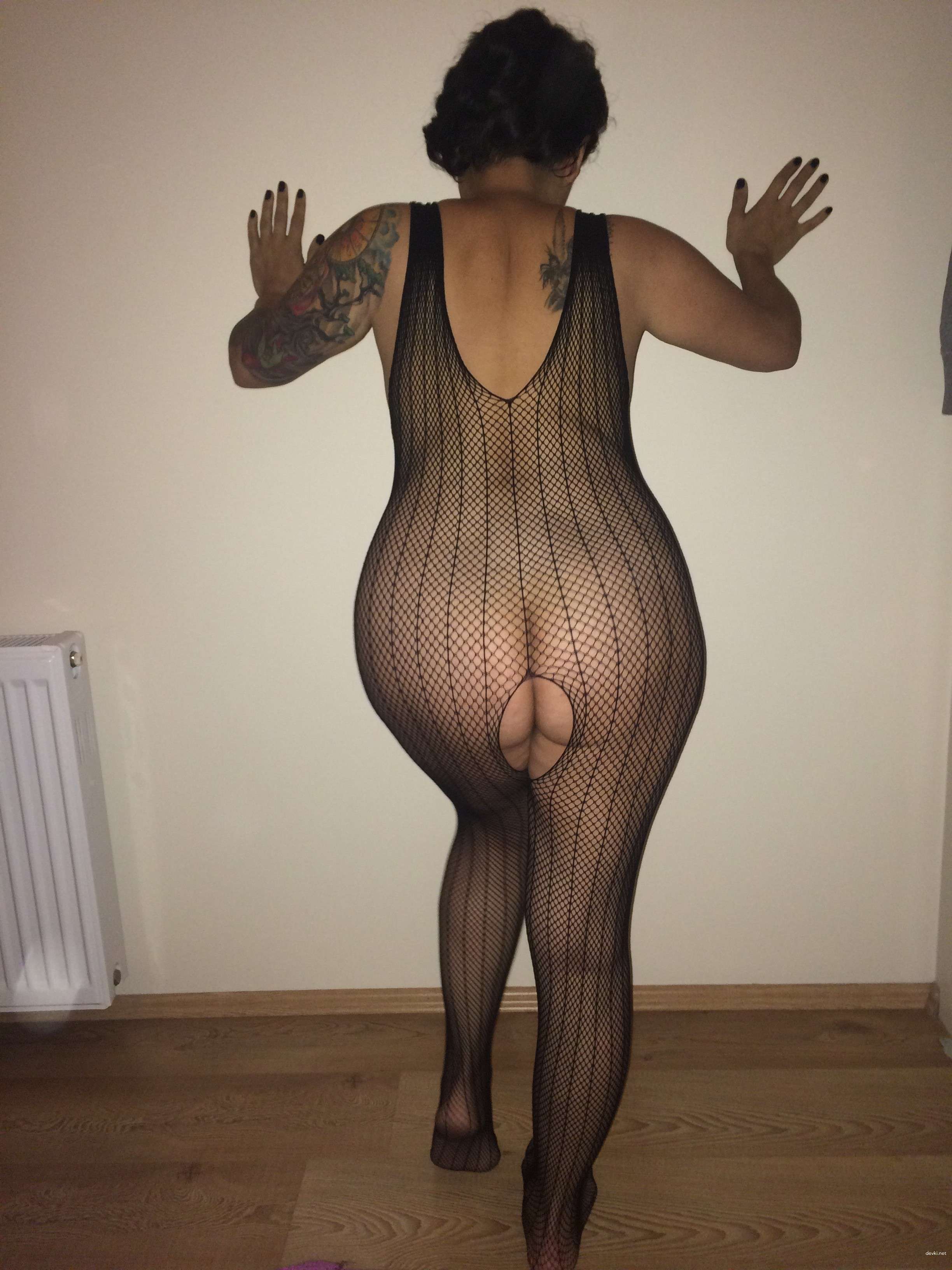 Seductive Woman Laid Out on Bed in Sensual Pose - Explicit Bedroom Shot