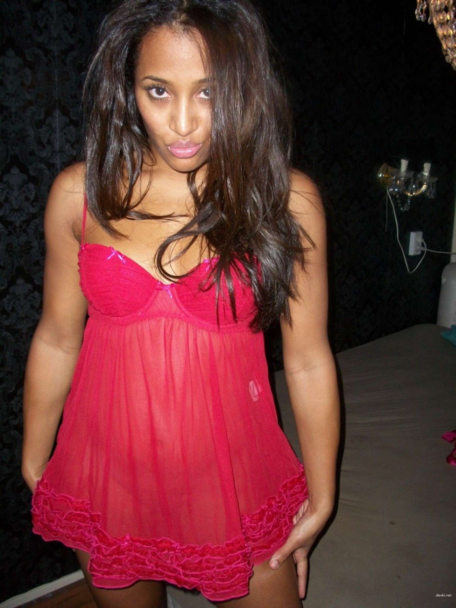 Seductive Mulatto Babe Gets Down and Dirty (Part 2) - Explicit Interracial Porn Photo