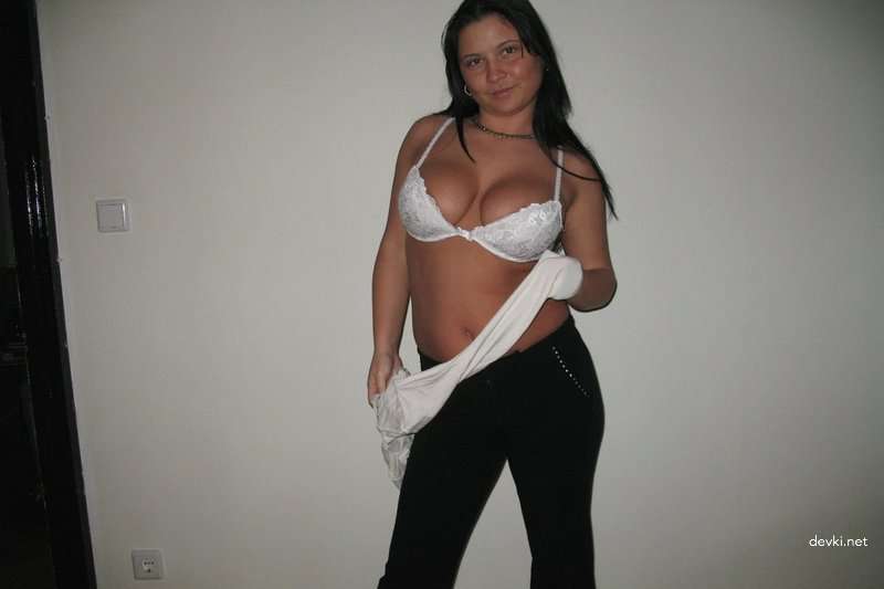 Brunette Poses Nude: Explicit Photoshoot with Naked Woman
