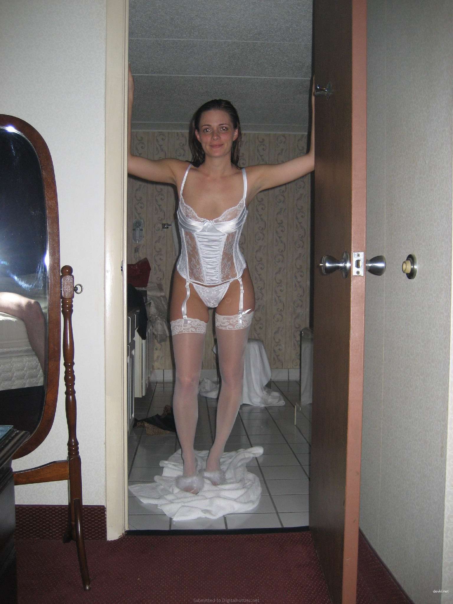 Hot woman flaunts massive tits in explicit photo shoot