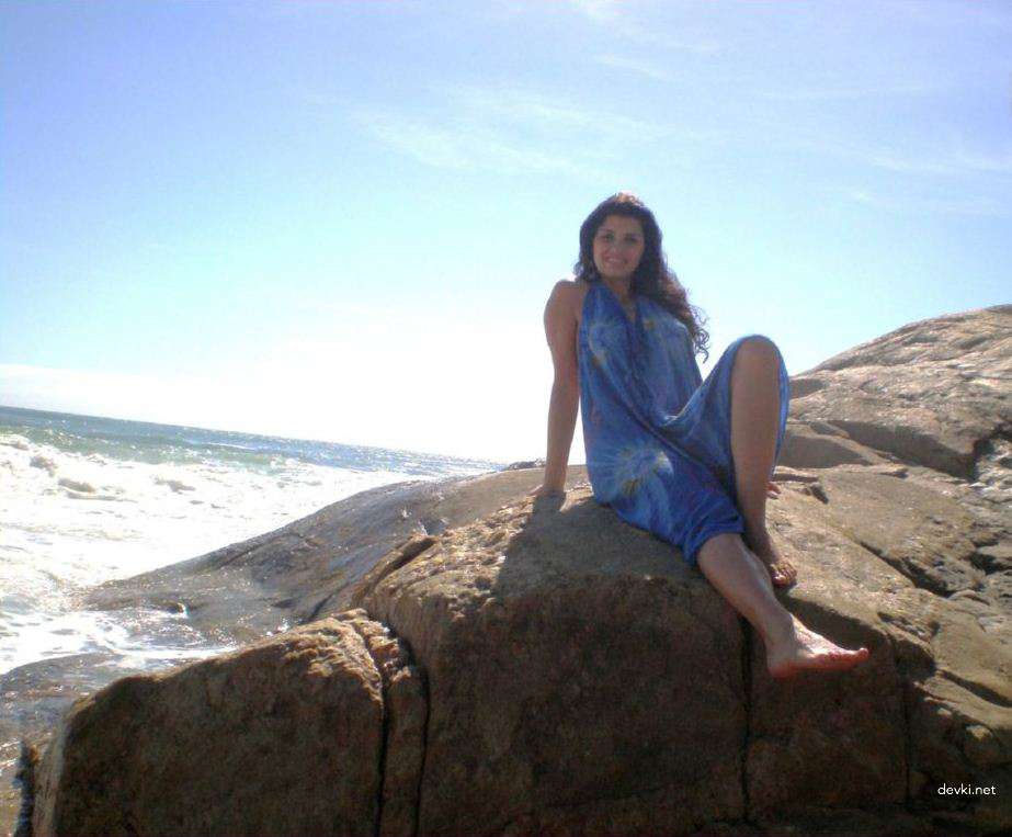 Sexy Brunette Babe Sunbathing Topless on Vacation