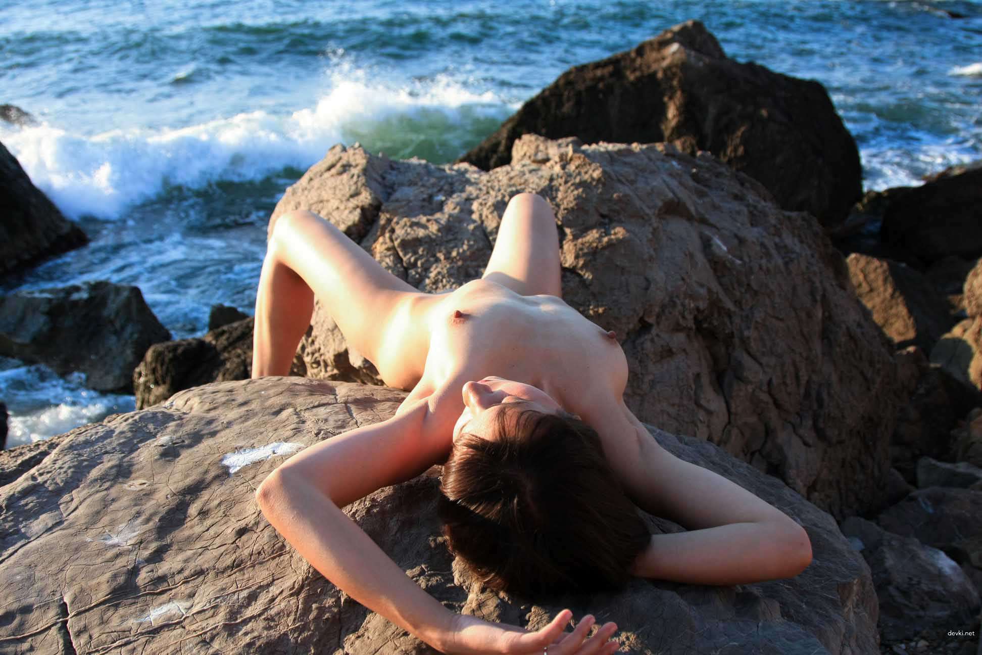 Sunbathing Nude with Wife on the Beach: Explicit Vacation Fun