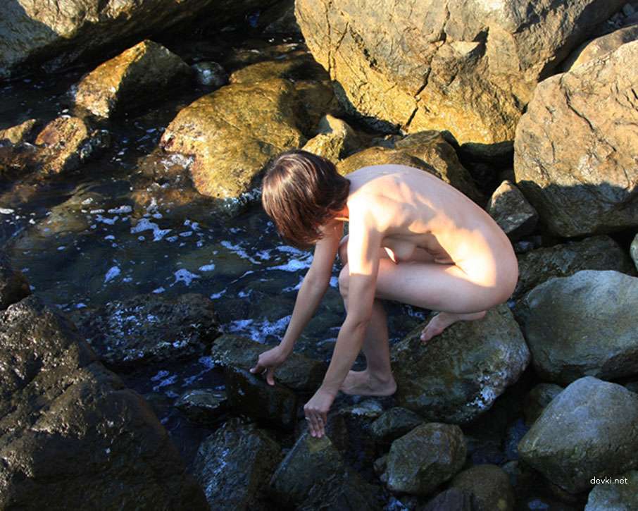 Sunbathing Nude with Wife on the Beach: Explicit Vacation Fun