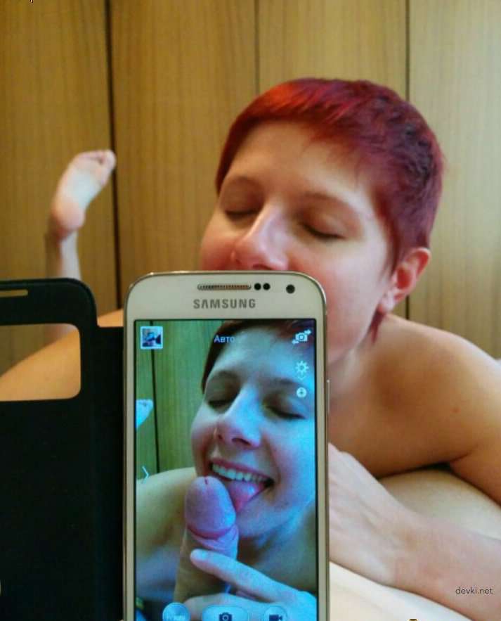 Short-haired babe gives explicit blowjob