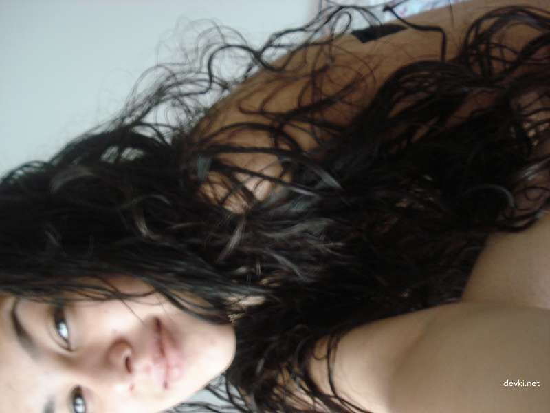 Naked Curly Haired Mulatto Babe Exposed in Provocative Photo Shoot