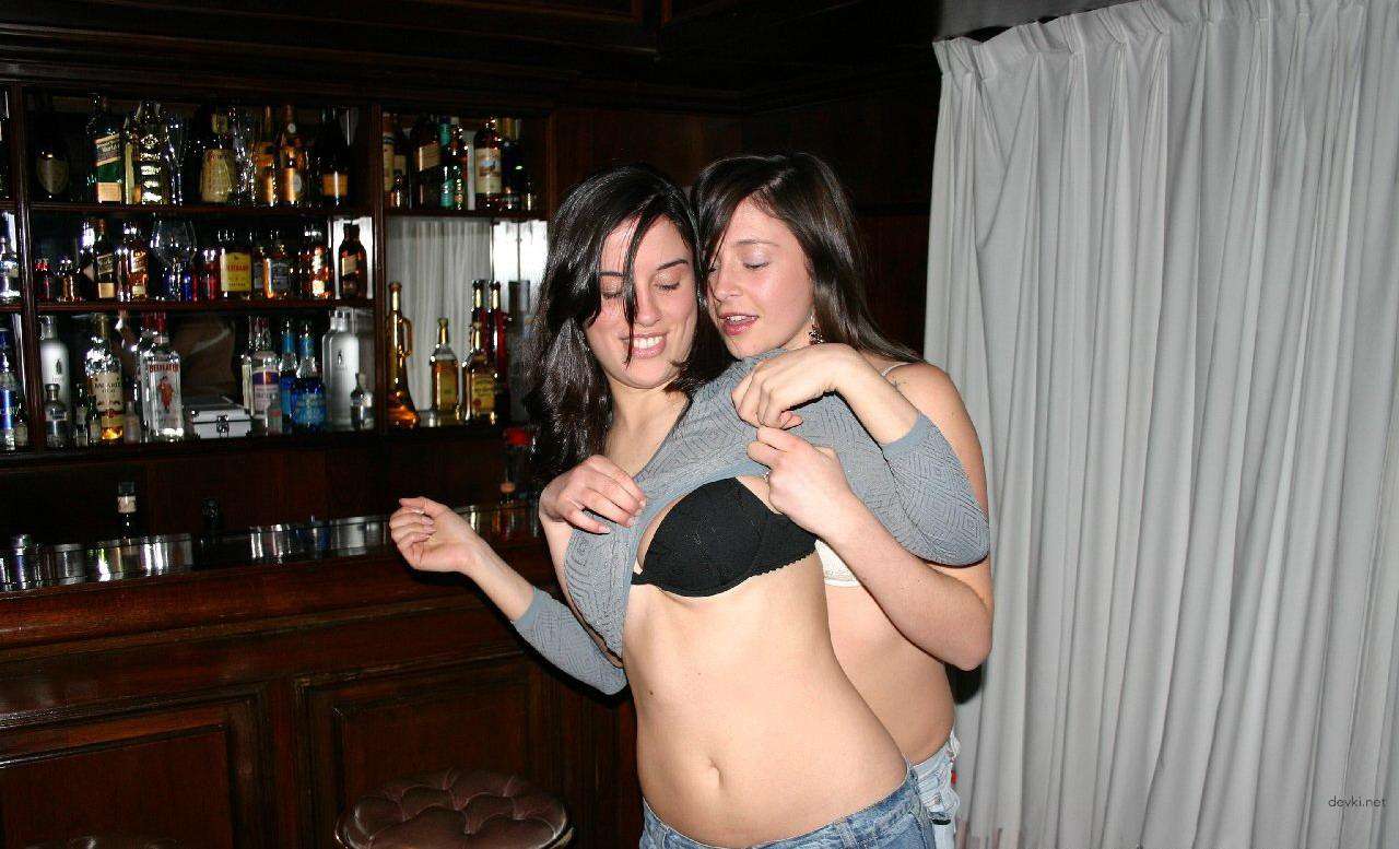 Two Babes Strip Tease at Bar: Hot and Explicit Performance!