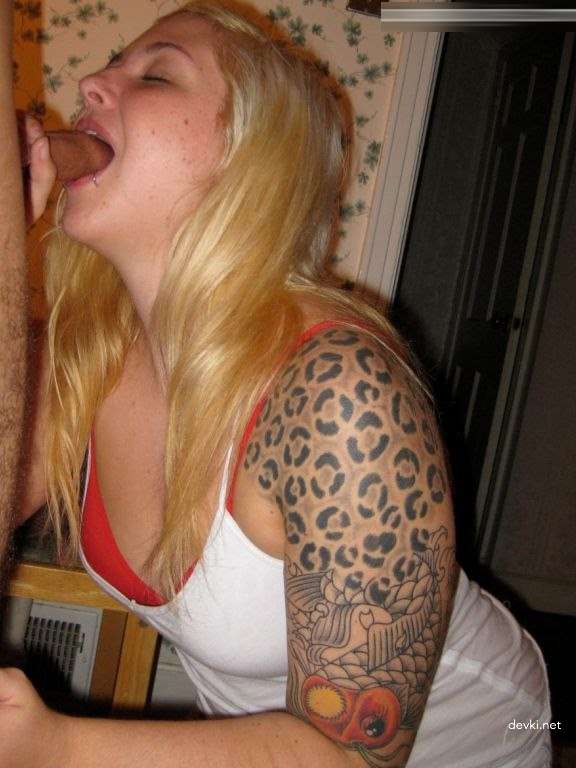 Tattooed Girl Gives Blowjob: Explicit Oral Sex Photo