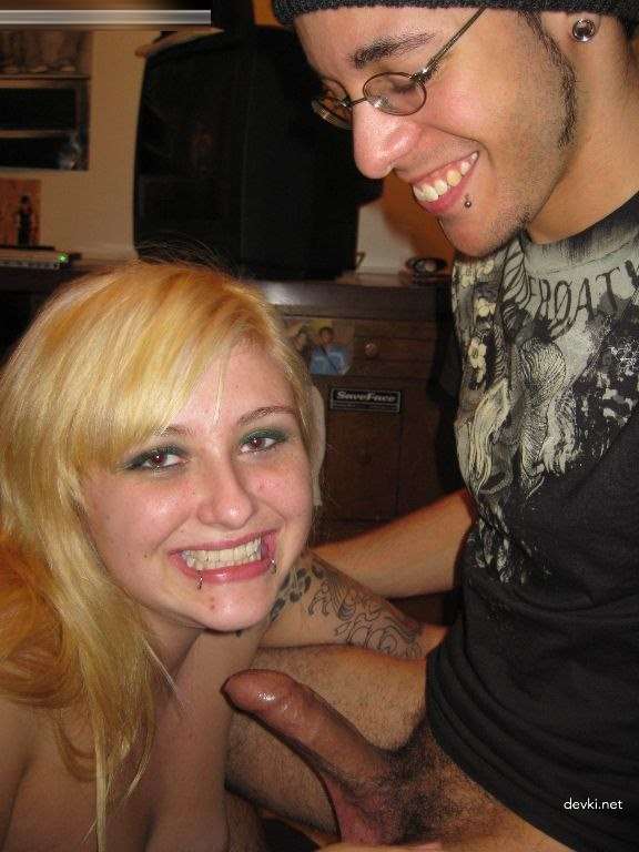Tattooed Girl Gives Blowjob: Explicit Oral Sex Photo