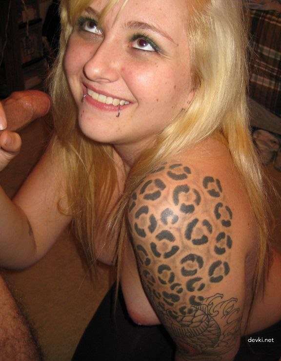 Tattooed Girl Gives Blowjob: Explicit Oral Sex Photo