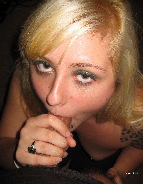 Tattooed Girl Gives Blowjob: Explicit Oral Sex Photo