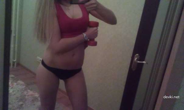 Sensual Beauty: Hot Babe in Light Erotic Pose