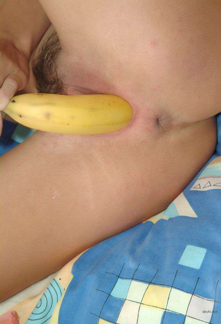 Busty babe fucks herself with banana in her tight ass