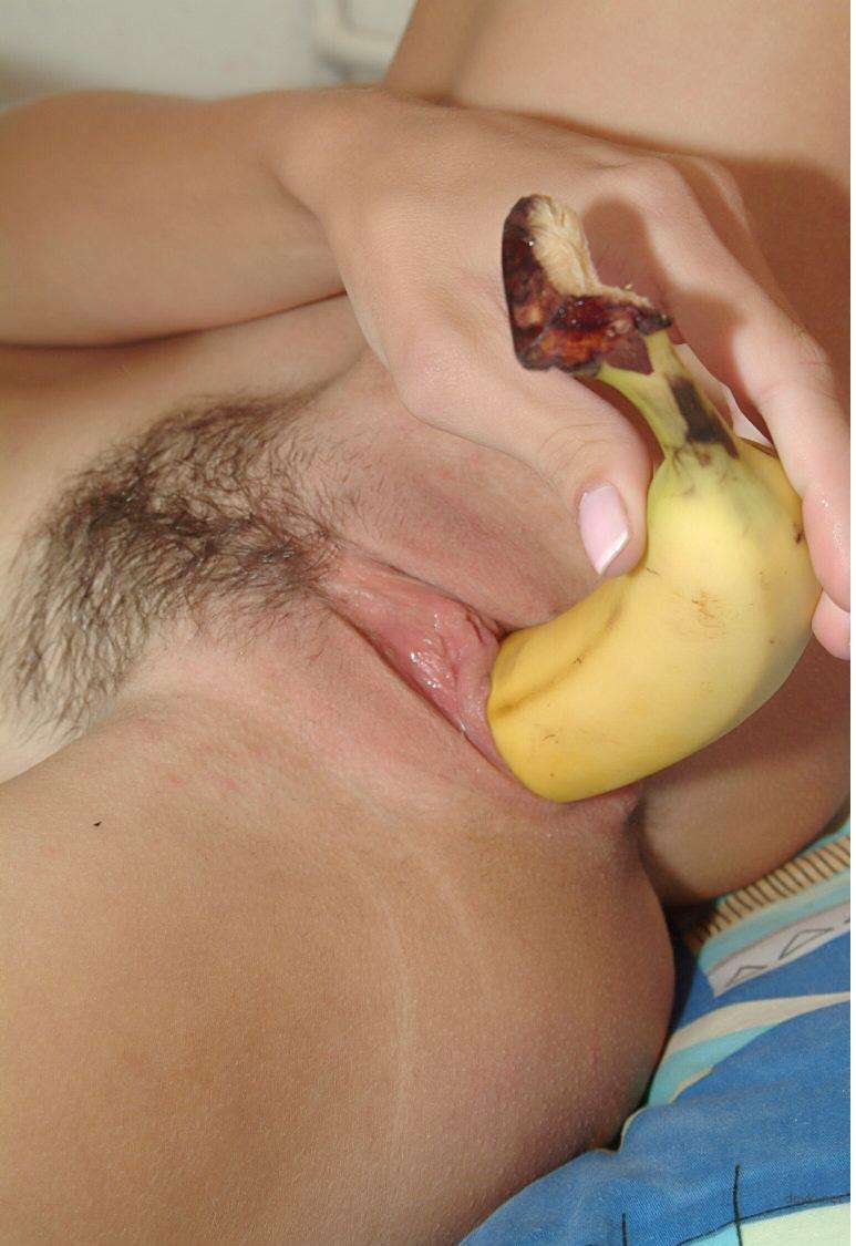 Busty babe fucks herself with banana in her tight ass