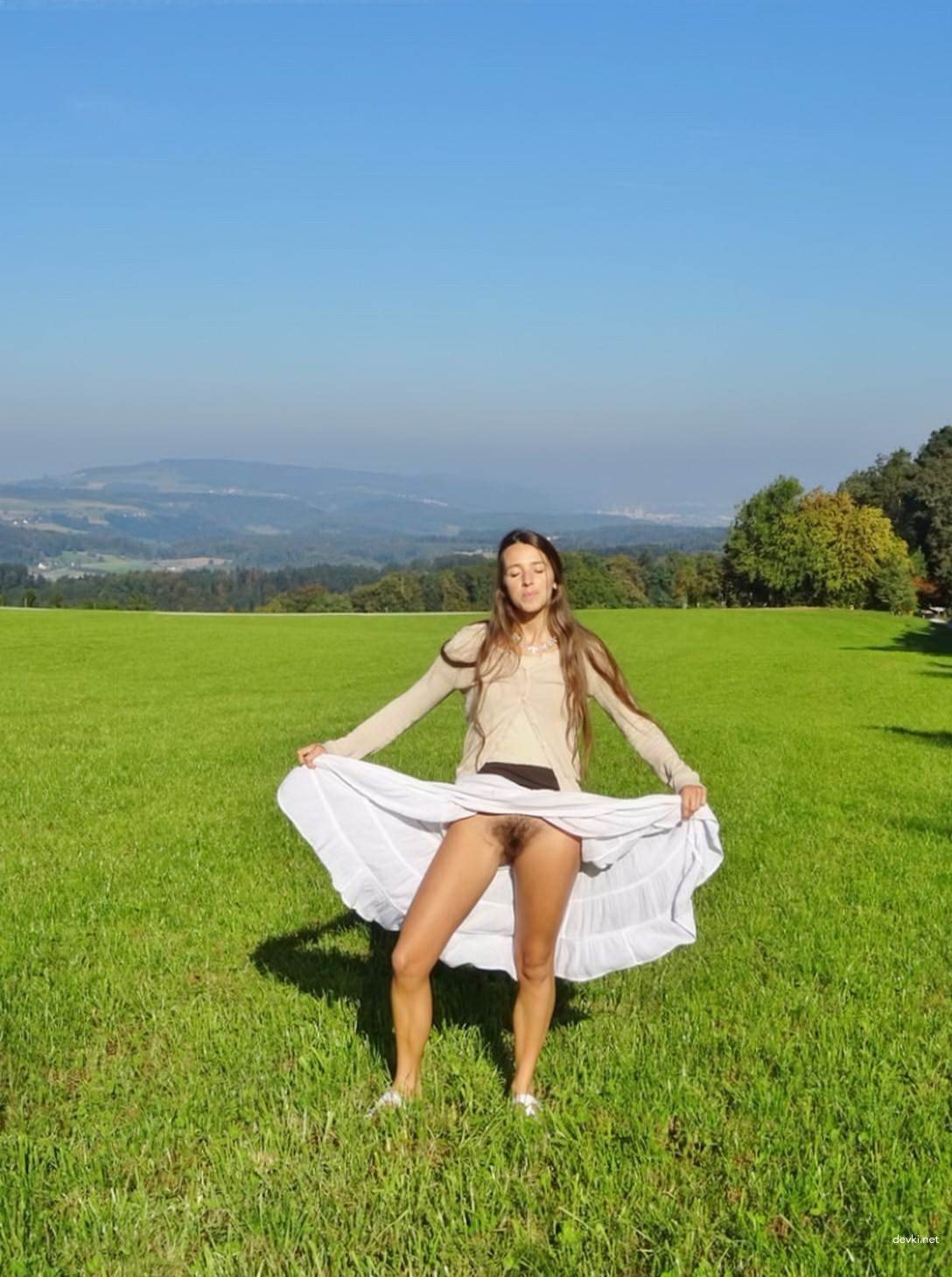 Seductive Long-Legged Girl in Erotic Photoshoot