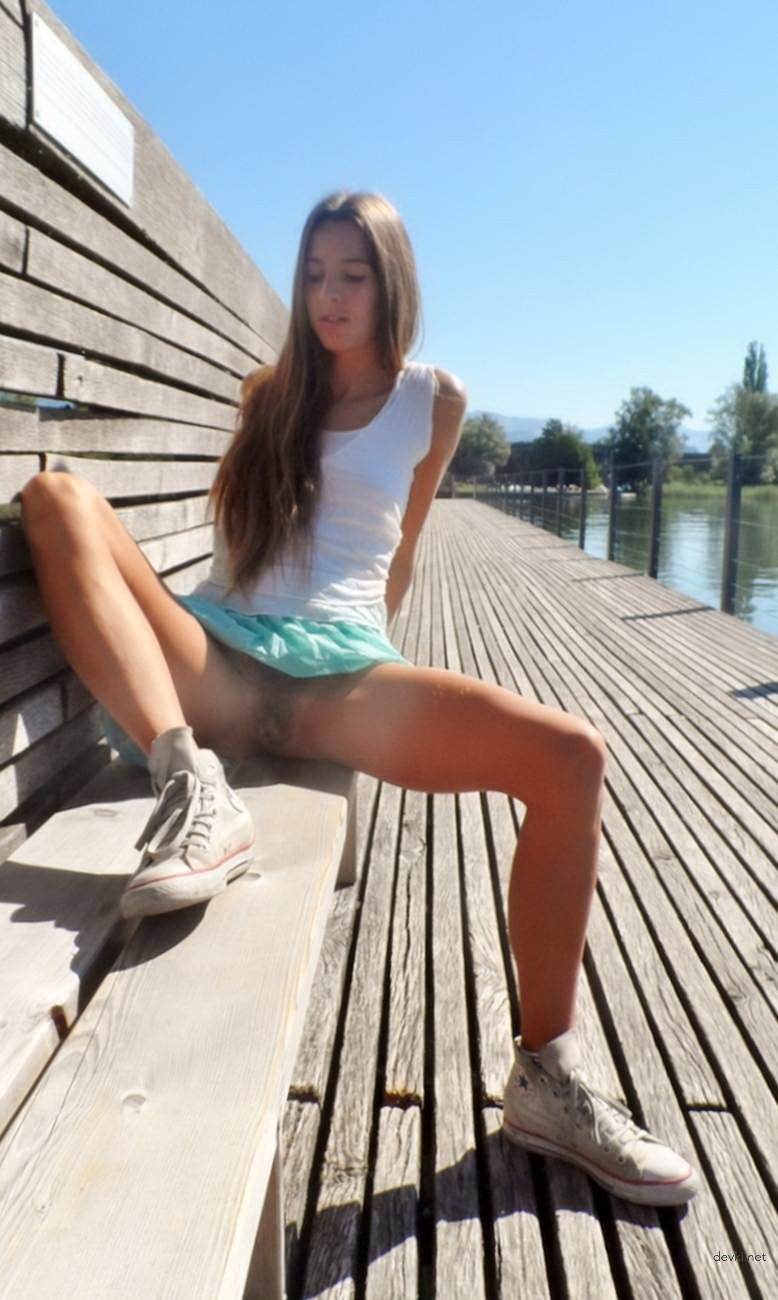 Seductive Long-Legged Girl in Erotic Photoshoot