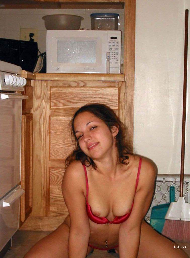 Brunette Poses Seductively in Kitchen: Hot Cooking Babe Shows It All