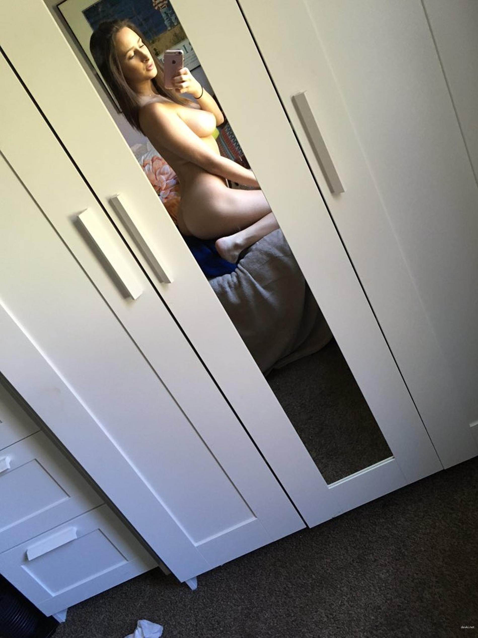 Private Nude Photo: Intimate Bedroom Snapshot of Naked Woman